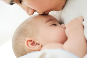 Baby having mom's care